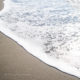 White waves on the beach