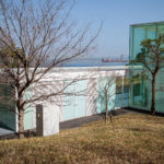 Back of the museum and a cargo ship